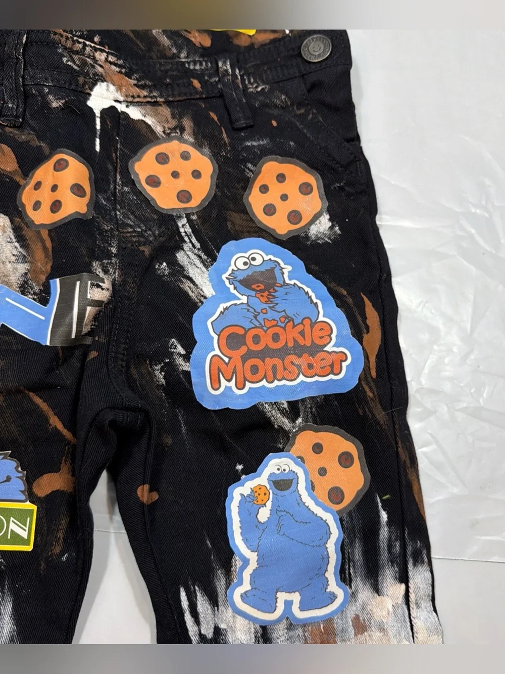 OFFCORSS BLACK denim bib overall jeans white tan paint splatters COOKIE MONSTER